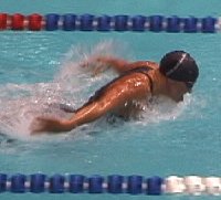 Jenny Thompson swimming fly.