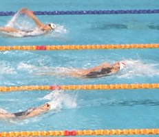 The top three women during the 200 Back.