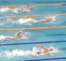 Rosolino (center) leads Dolan (top), and Wilkens (bottom) to the finish of the 200 IM.