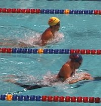 Kaitlin Sandeno leads Maddy Crippen nearing the end of the Breaststroke leg.