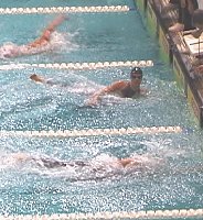 Dara Torres touches first with the fastest qualifying time.