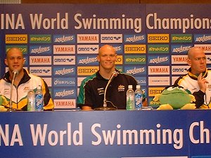 Australian 4 x 100 Free relay swimmers at the post race interview. Michael Klim in the center.