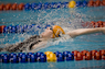 Jenny Connolly sets state H.S. record in 100 backstroke.