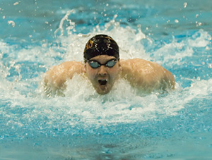 Ian Crocker wins 100 Fly at American Short Course Championships.