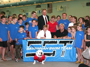 Judson Cuttino signing his national letter-of-intent with his parents, club coach, members of the Savannah Swim Team and Uga VI.
