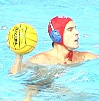 Dan Hackett, USA goalie, with the ball.