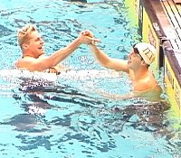 Two Texas boys, Josh Davis and Neil Walker, are happy with their morning swims.