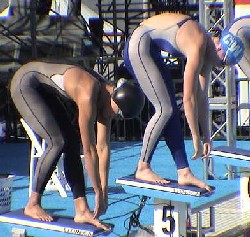 Kara Lynn Joyce, right, was the upset winner over Natalie Coughlin in the 100 Free final.
(Photo: M. Collins)