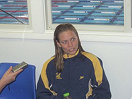 Natalie Coughlin meets the press after breaking the world record in the 100m backstroke.
