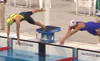 Susie ONeill and Lindsay Benko dive in for the heats of the 200 Free.