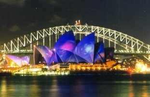 The Opera house lite up with Olympic colors.