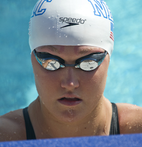 2011USANATS Elizabeth Pelton takes her mark in the prelims of the 100 backstroke at the 2011 US Swimming Nationals.