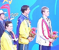 Perkins, Hackett, and American Chris Thompson on the awards stand for the 1500 Free