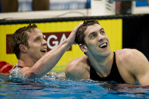 Erik Vendt congratulates Michael Phelps on winning the 200 meter freestyle.