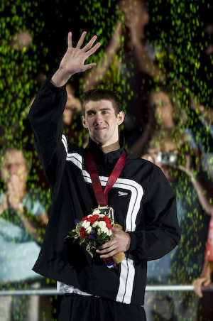 Michael Phelps receives award as the first member of the 2008 USA Olympic Swimming Team.