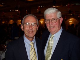 Caption: Newly-elected USA Swimming President Ron van Pool (left) with legendary Coach Peter Daland. 2002