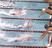 Roland Schoeman of AZ leads off his teams 200 Free Relay in a World Record time of 21.28.
