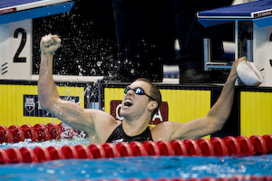 Scott Spann celebrates winning the 200 meter breastroke final.