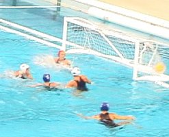USA women score a goal in the water polo final against Australia.