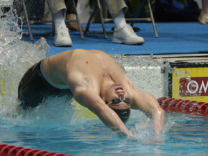 Aaron Piersol qualifies first in 100 back.