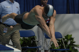 Brendan Hansen wins 100 Breaststroke
