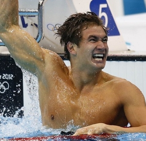Nathan Adrian (USA) reacts after winning the gold medal in the men's 100m freestyle final during the London 2012 Olympic Games at Aquatics Centre.