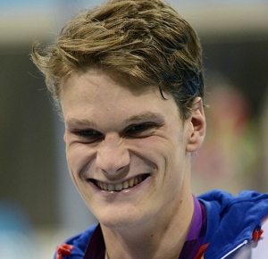 Yannick Agnel (FRA) poses with his gold medal after winning the men's 200m freestyle finals during the London 2012 Olympic Games at Aquatics Centre.