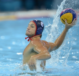 USA player Tony Azevedo (8) with the ball. USA defeated Great Britain 13-7 during the London 2012 Olympic Games at Water Polo Arena.