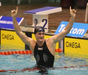 Cameron van der Burgh smiles broadly after smashing the world record in the 50 metres breaststroke at the Telkom SA National Aquatic Championships at the Kings Park Aquatic Centre in Durban on Saturday. The Pretoria swim star clocked 27.06 to dip under the previous mark of 27.18 held by Oleg Lisoger set in 2002.