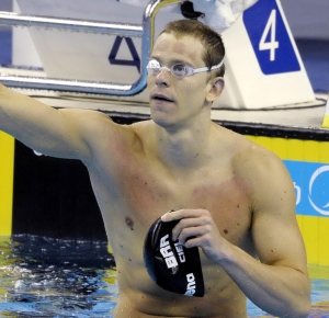 Cesar Cielo Filho of Brazil celebrates after winning the gold medal after the Men's 50m Freestyle Final during Day fifteen of the 14th FINA World Championships at the Oriental Sports Center.