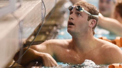 Tyler Clary checks his time after winning the men's 400 meter individual medley during the Austin Grand Prix at the Texas Swimming Center.