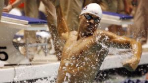 Arizona swimmer Kevin Cordes celebrates his victory in the 100-yard breaststroke event in the 2012 Division I swimming championship at Weyerhaeuser King County Aquatic Center.