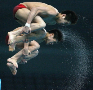 Lin Yue and Huo Liang of China in action during the mens synchronized 10m final at the 16th FINA Diving World Cup in the National Aquatics Center.