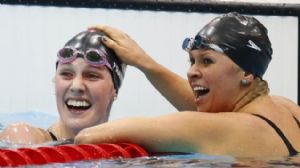 USA swimmer Missy Franklin (left) celebrates with Elizabeth Beisel (right) after the women's 200m backstroke final during the London 2012 Olympic Games at the Aquatics Centre. Franklin won the gold medal setting a new world record at 2:04.06. Beisel won the bronze.