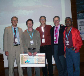 Dr. Josh White earns Archimedes award in Porto, Portugal.