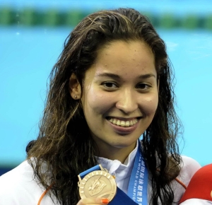 Ranomi Kromowidjojo (NED), left, after the women's 100m freestyle final of the 14th FINA World Championships at the Oriental Sports Center.