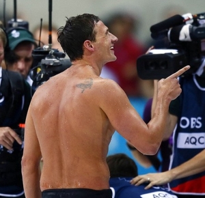 USA swimmer Ryan Lochte reacts after winning the gold medal in the mens 400 individual medley during the 2012 London Olympic Games at Aquatics Centre.