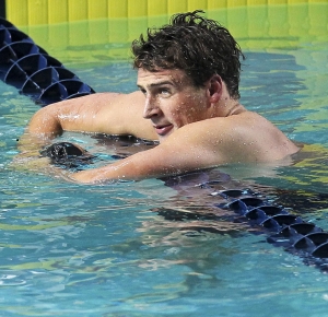 Ryan Lochte rests after winning the 200m backstroke at the Duel in the Pool in the Georgia Tech Aquatics Center.
