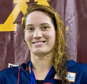 Camille Muffat (FRA) on the podium after winning the womens 800 meter freestyle finals in the Minneapolis grand prix at the University of Minnesota Aquatic Center. Muffat won with a time of 8:31.23.