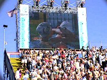 Natalie Coughlin and Haley Cope on the big screen after finishing 1-2 in the 100 Back - 2004 Olympic Trials