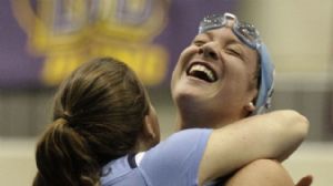 Stephanie Peacock of the North Carolina Tarheels celebrates after setting a new NCAA record in the 1650 freeestyle final during the NCAA Womens Division I Championship at the James A. Martin Aquatic Center.