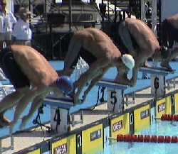 Phelps, center, qualified first in the 200 IM