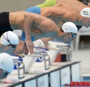 Michael Phelps (USA) at the start of a men's 200m butterfly heat during the 2012 London Olympic Games at Aquatics Centre.