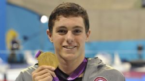 Ian Jaryd Silverman (USA) shows off his gold medal from the men's 400m freestyle - S10 during the London 2012 Paralympic Games at Aquatics Centre.