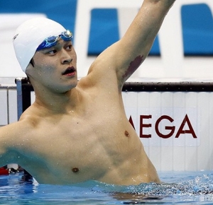 Sun Yang (CHN) celebrates after winning his men's 200m freestyle semifinal during the London 2012 Olympic Games at Aquatics Centre.