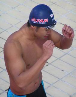 pumps hands after 100 breast win