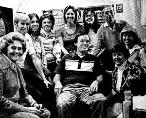 This is the Swimming World Magazine gang who did it all for you in the January issue of 1977. From left, Faye Schoenfield, business mgr.; Matt Finneran, ed. ass't,; Sandy Mowatt, circ.; Arlene Kirk, publisher's ass't.; Virginia McCarty, ass't, editor;Judy Jacob, circulation; Al Schoenfield, publisher: Ann Churchill. ed, ass't.; Lynn Moore, typesetter-ed, ass't.; Bob Ingram, editor.