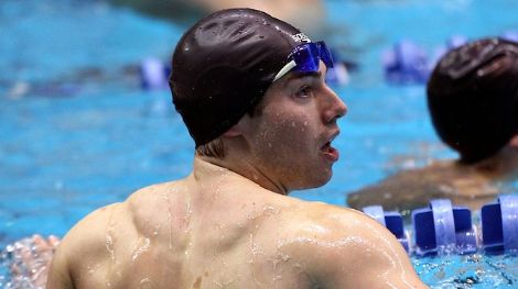Zachary Turk of Kenyon looks up at the scoreboard after winning the men's 100 yard freestyle during the Division III Mens and Womens Swimming and Diving Championship held at the IU Natatorium in Indianapolis, IN. Turk won with a time of 43.16.