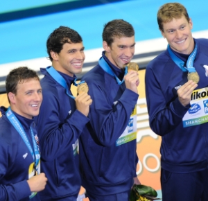 Shanghai, CHINA; Ryan Lochte, Richard Berens, Peter Vanderkaay and Michael Phelps of the United States pose with their gold medals after the men's 4x200m freestyle of the 14th FINA World Championships at the Oriental Sports Center.
