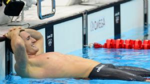 Cameron van der Burgh (RSA) celebrates after winning the men's 100m breaststroke finals in a world record time of 58.46 during the London 2012 Olympic Games at Aquatics Centre.